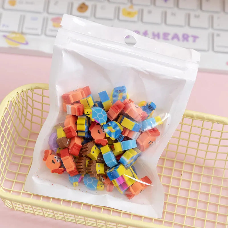 50 colourful cartoon mini erasers in pearlescent bags showing fruit, animal, and holiday designs