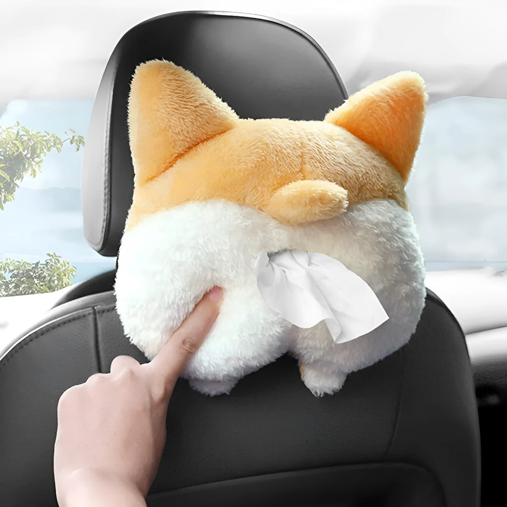 Yellow corgi butt-shaped polyester tissue box cover hanging on a car sun visor.