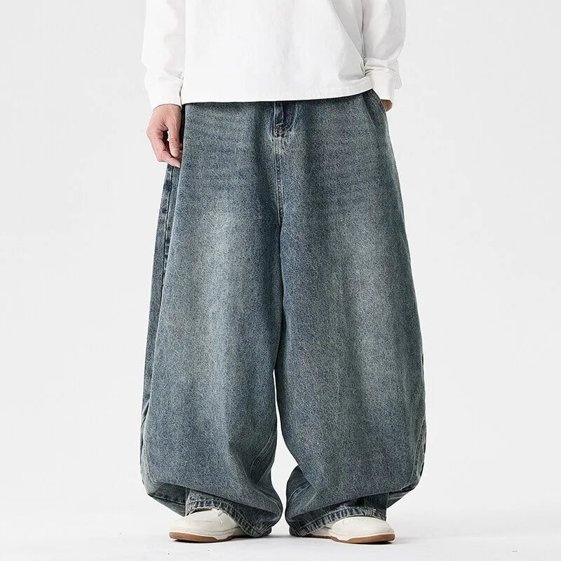 Men's plus size wide leg baggy jeans in black denim with straight leg openings