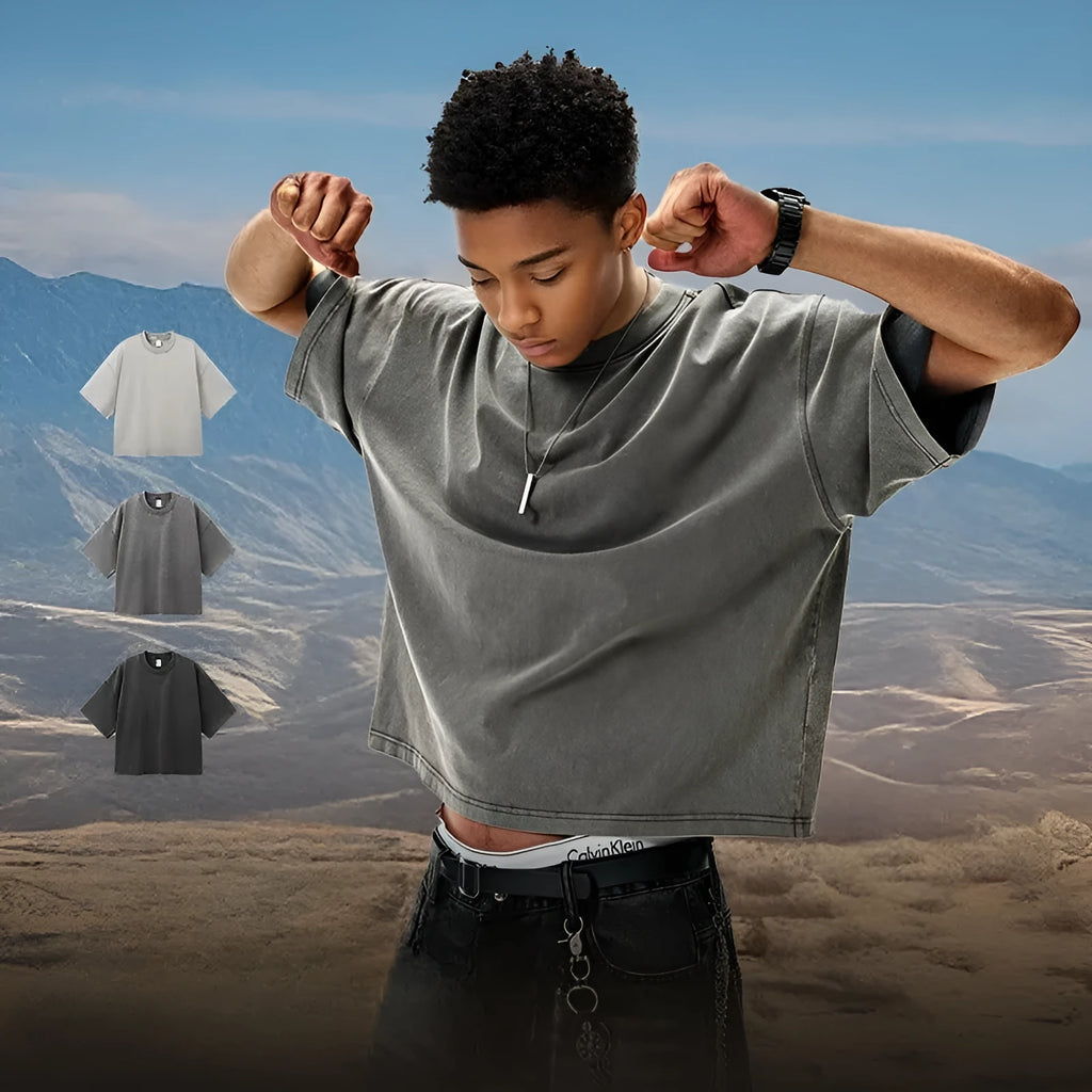 Men's vintage cotton t-shirt with washed-out treatment in khaki light colour showing loose fit and drop-shoulder sleeves