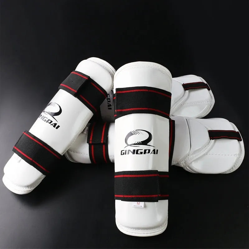 Taekwondo protective gear set showing leg guards and arm guards in PU EVA material