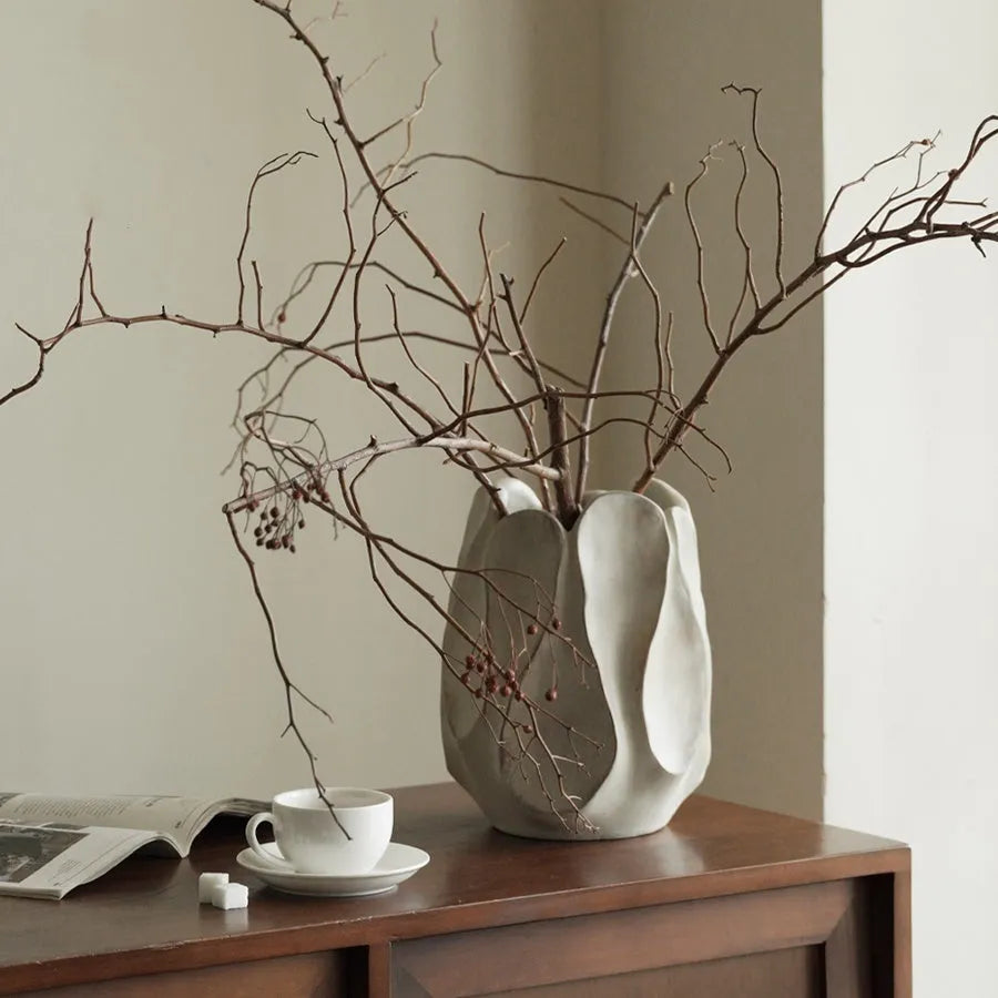 Irregular ceramic vase in contemporary art style for flower arrangements
