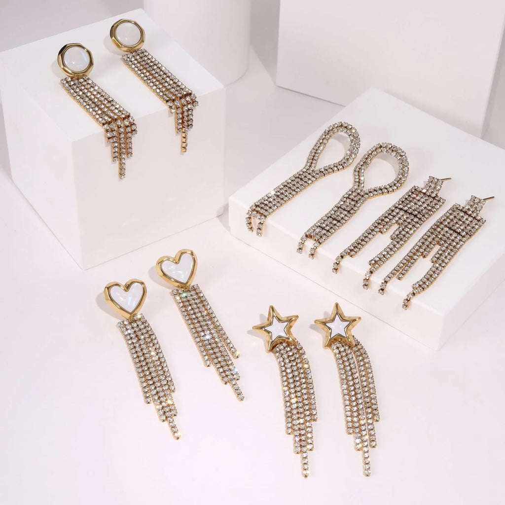 Women's stainless steel earrings with diamond tassel and love heart charm in gold tone