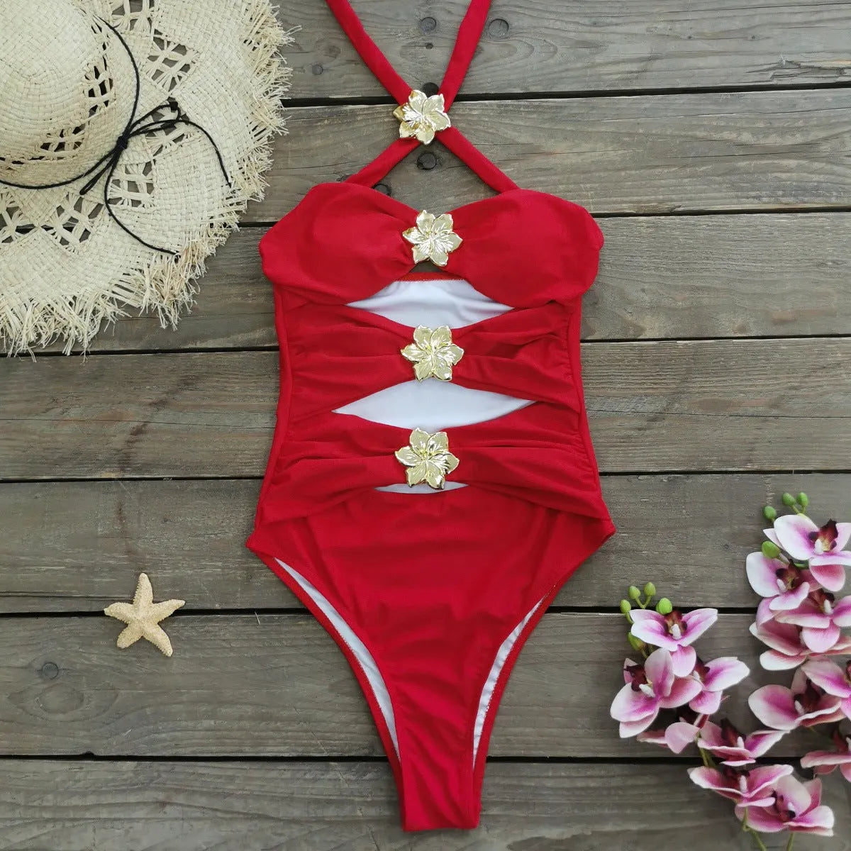 Women's black one-piece swimsuit with matching skirt and hollow-out tube top design
