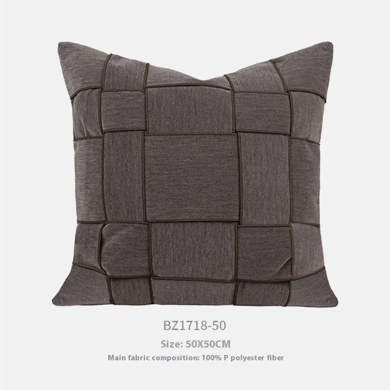 Chenille woven square pillow cushion in beige colour on a sofa