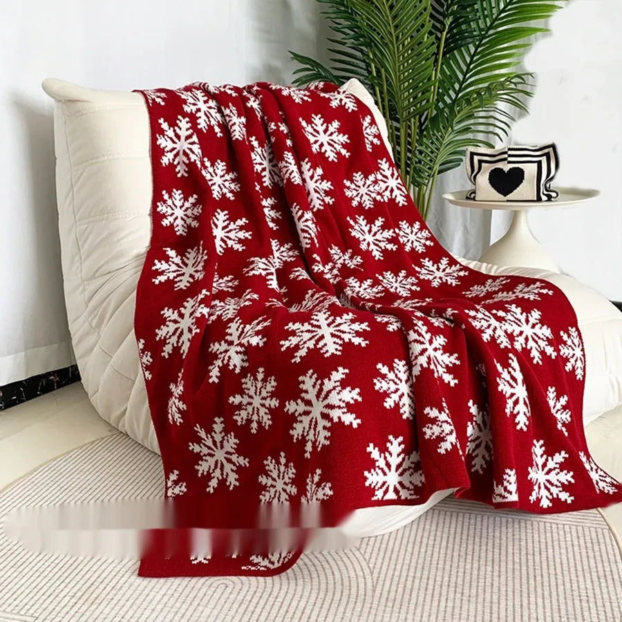 Personalised Christmas blanket with festive snowflake or reindeer pattern in acrylic fabric