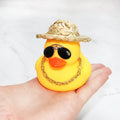 Straw hat yellow duck cartoon car dashboard ornament with sunglasses accessory on matte finish