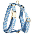Blue triangular pattern dog harness set with matching leash, collar, and fabric bow accessory