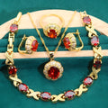 18k gold plated jewellery set with multi-colour cubic zirconia stones including necklace, earrings, ring, and bracelet.