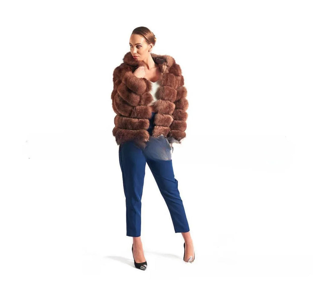 A woman's loose-fitting artificial fur hooded coat in street fashion style.