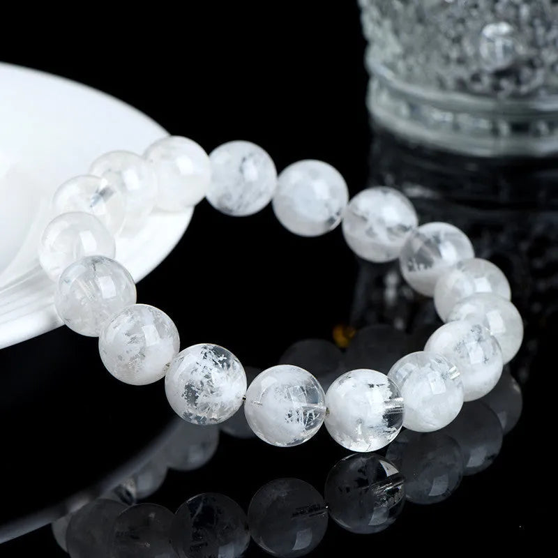 Women's crystal bracelet with natural blizzard snowflake round beads and ruyi xiangyun design elements