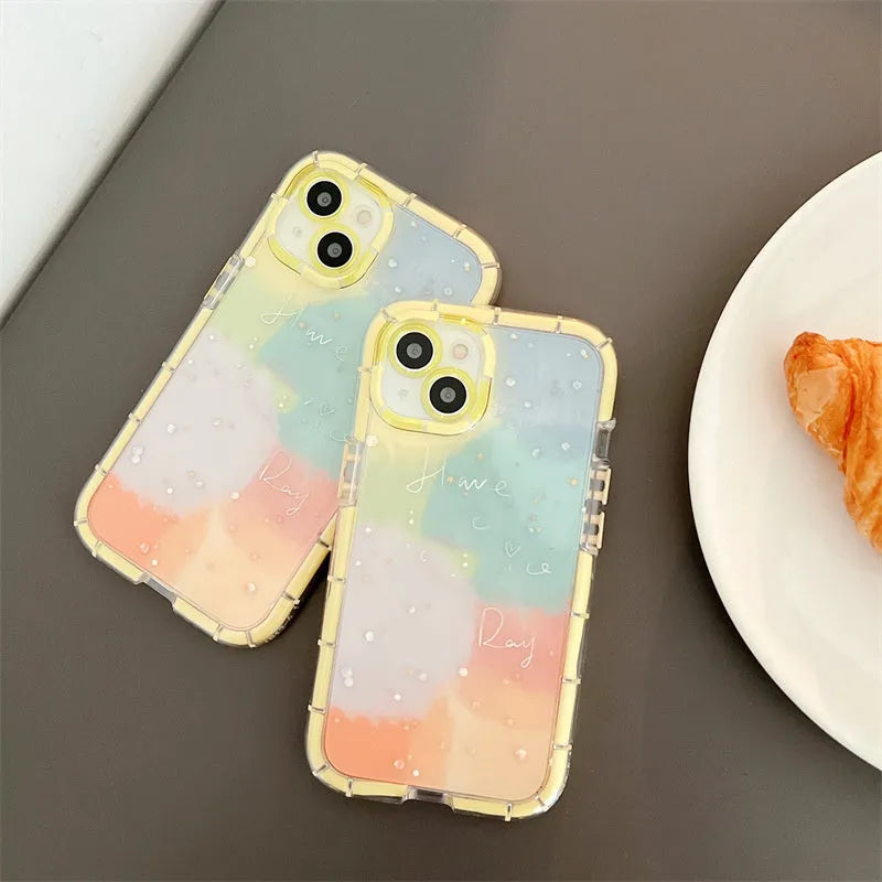 Slim minimalist silicone phone case for iPhone 14 with a yellow edge on a contrasting background.
