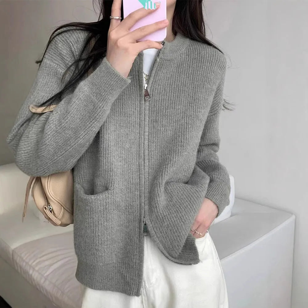 Beige soft glutinous sweater coat cardigan with long sleeves on hanger
