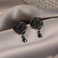 Black rose floral stud earrings with zircon accents on 18K electroplated copper