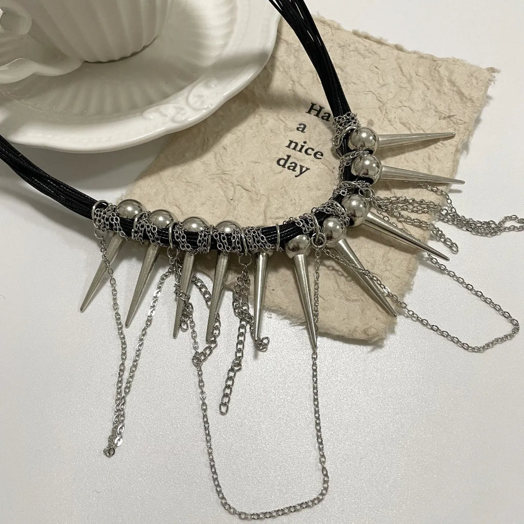 Women's leather necklace with electroplated round beads and a tassel drop in a casual, winding design.