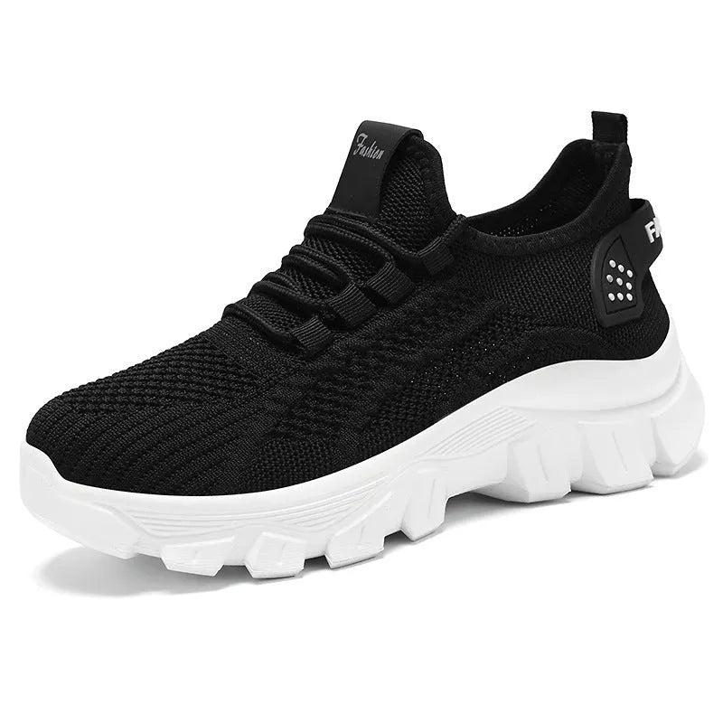 Women's breathable Flyknit sneaker with thick bottom PVC sole and round toe in white, pink, beige, or black.