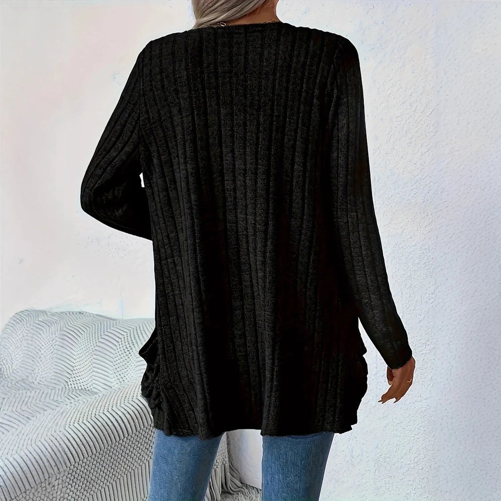 Women's loose-fit long sleeve cardigan with pockets in granny grey, shown on a hanger.