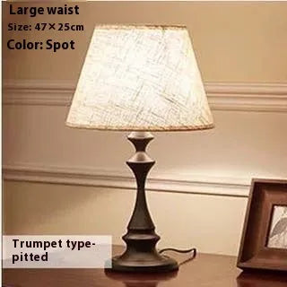 Brown retro alloy bedside lamp with dimmable LED lighting and speaker-style design