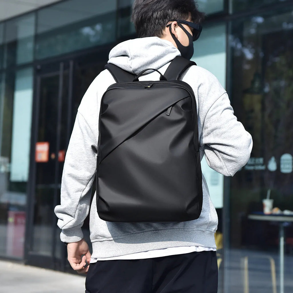 Men's waterproof backpack in black colour made from PU leather with large capacity design