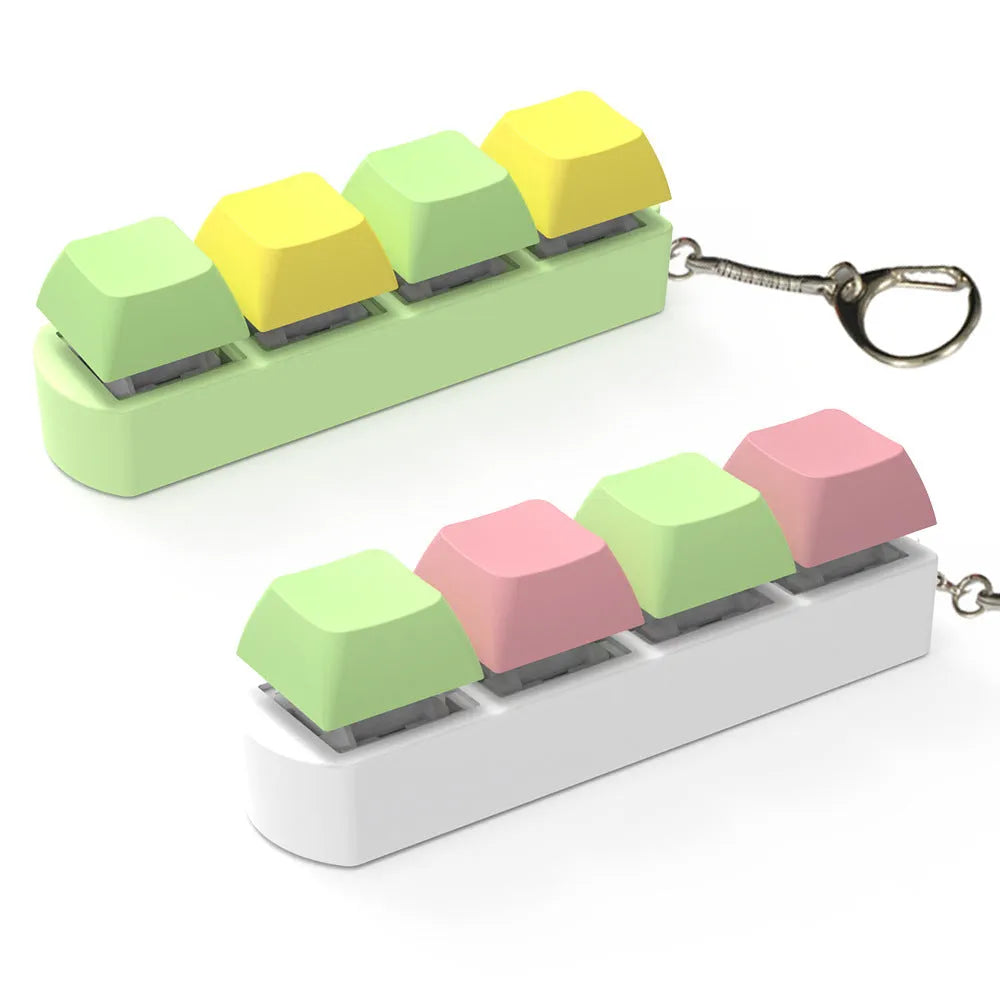 4-key mechanical keyboard switch tester with transparent bottom shell on desk
