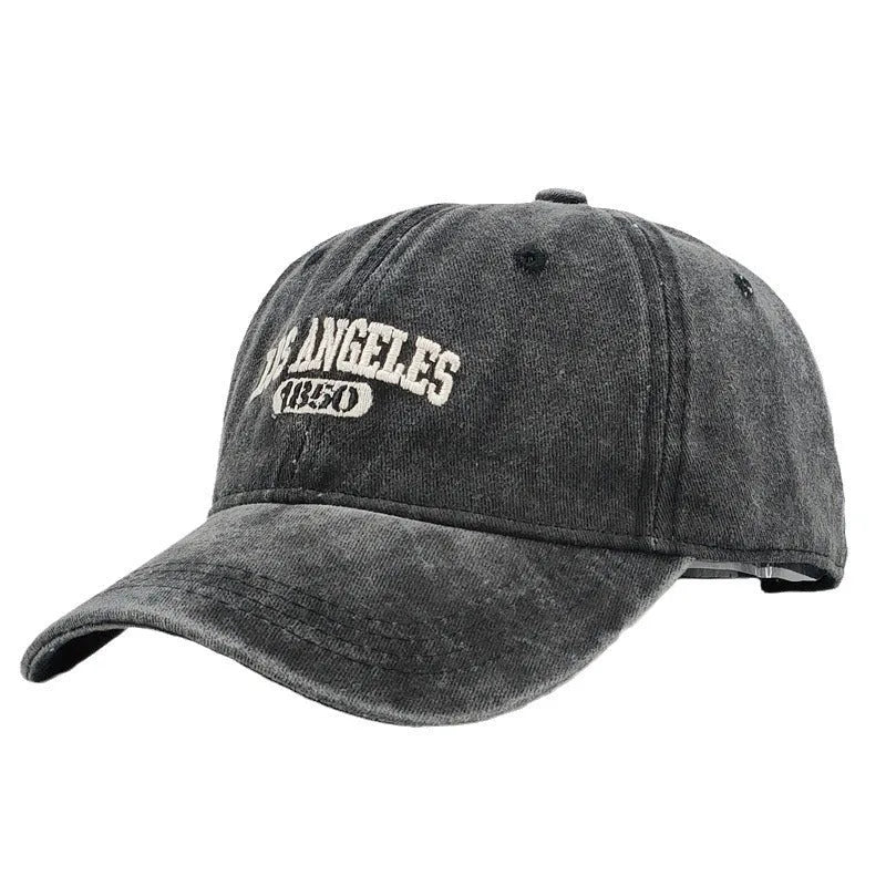 Retro adjustable peaked cap with distressed embroidery in conical crown design