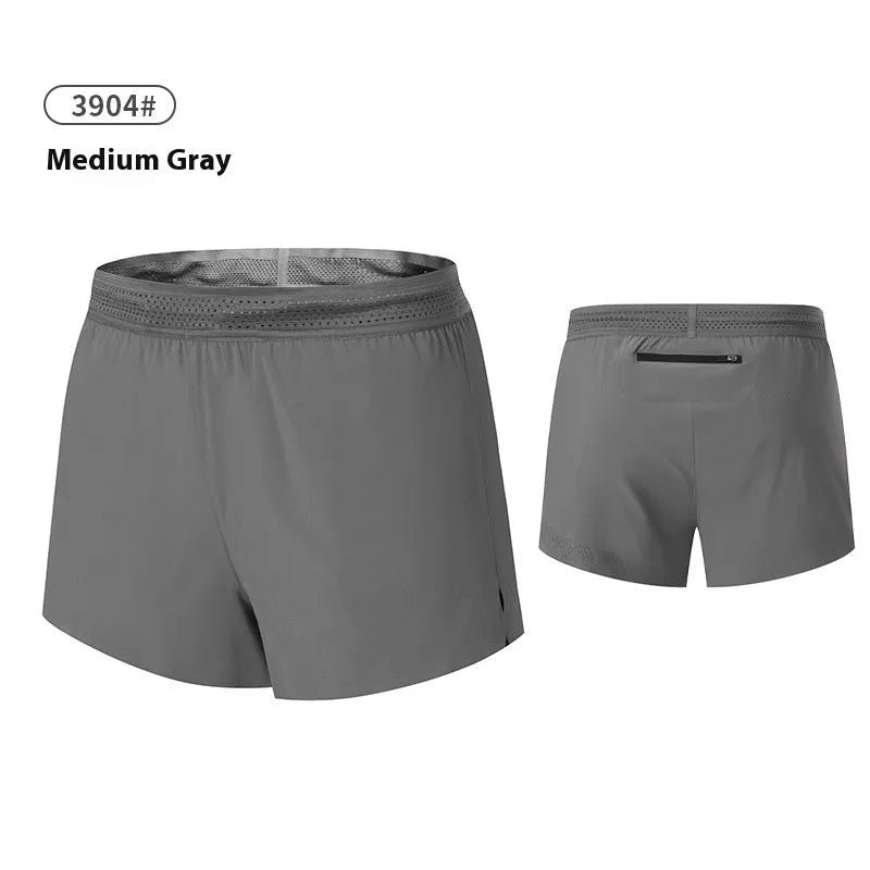 Men's solid colour low-waist basketball shorts made from polyester fabric.