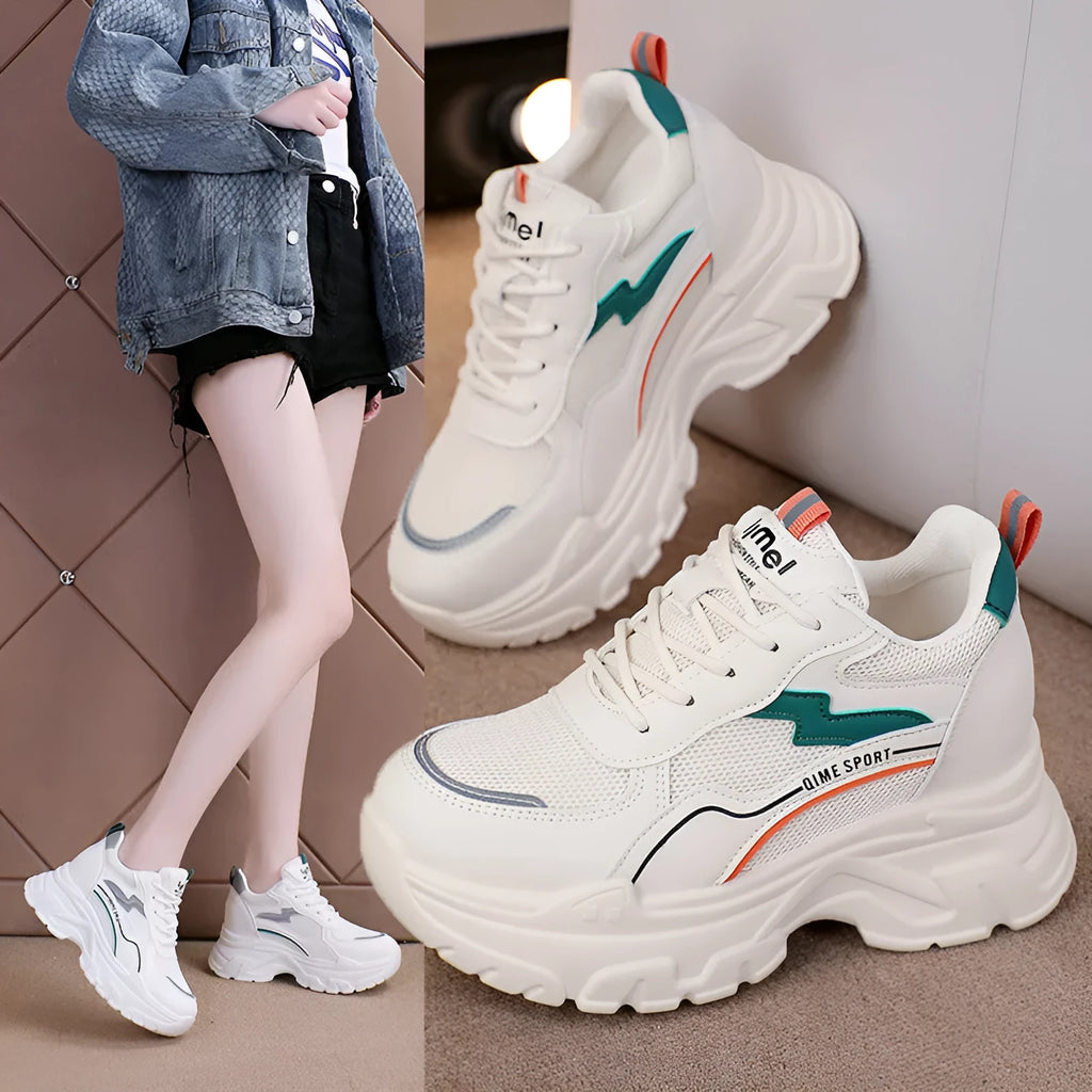 Beige women's lace-up dad shoes with cross straps and a round toe, on a white background.