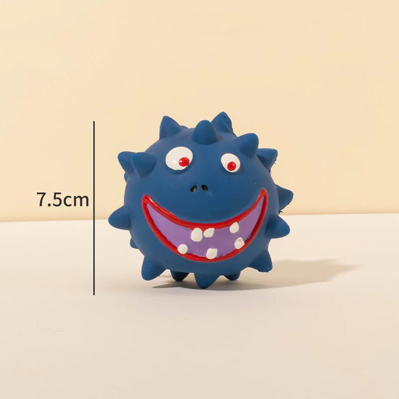 Four colourful squeaky dog balls with cute faces made from natural latex rubber with textured surfaces