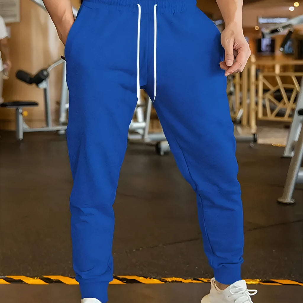 Men's loose-fit linen style leisure trousers with an elastic drawstring waist.