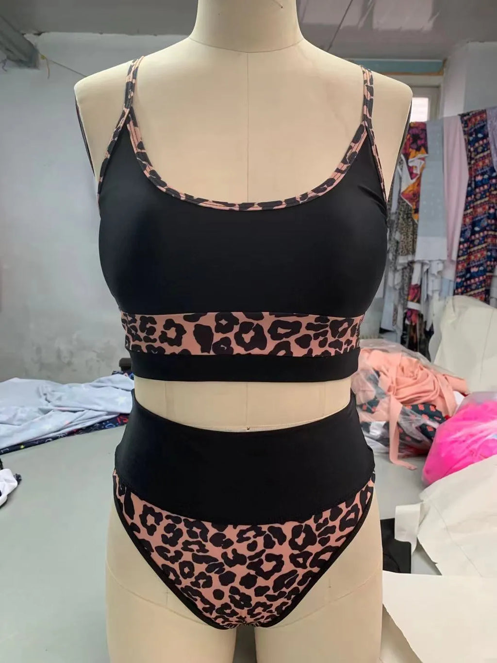 Women's high waist split bikini swimsuit in white and leopard print options with nylon fabric