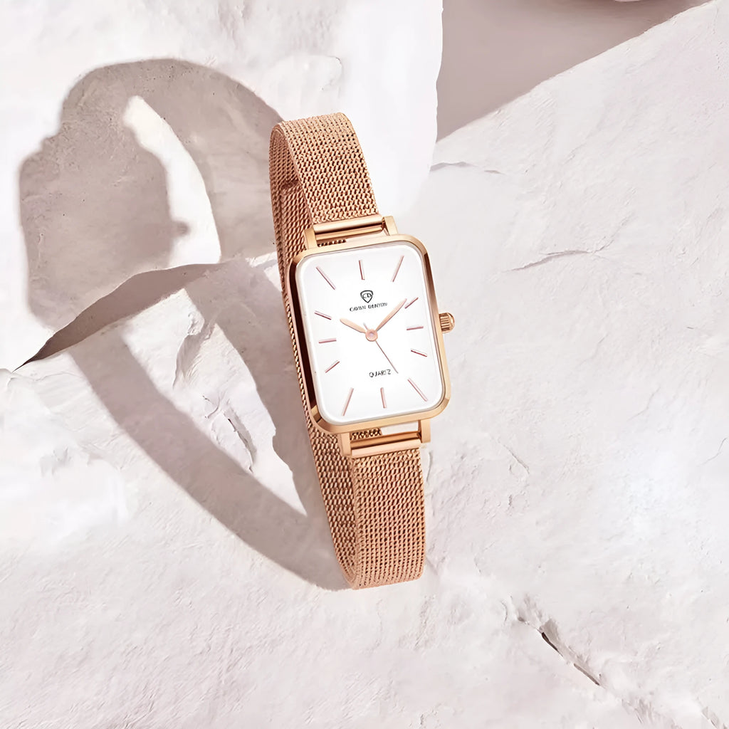 Women's rose gold waterproof quartz watch with woven steel strap and 34mm alloy case