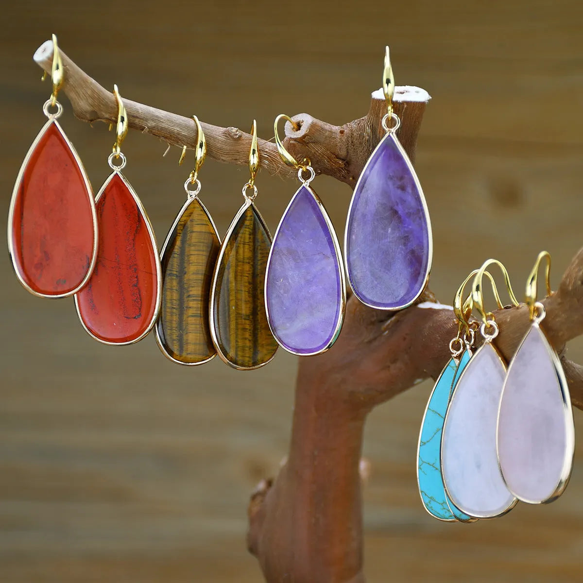 Vintage drop-shaped stone earrings in Tigereye, amethyst, pink crystal, Redstone, or turquoise colours.