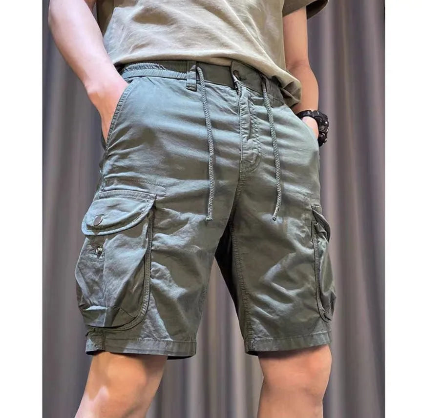 Korean style loose straight overalls pants with multiple pockets in micro-elastic polyester fabric.