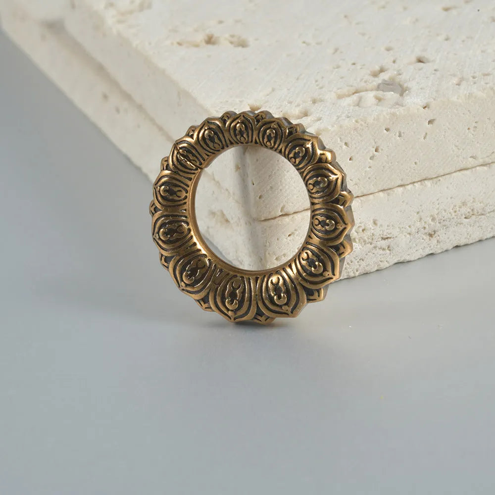 Retro hollow heart and lotus magnetic earrings in antique silver and gold finishes