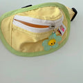 Pet backpack for dogs and cats in powder blue, yellow, and green colours with measured sizing