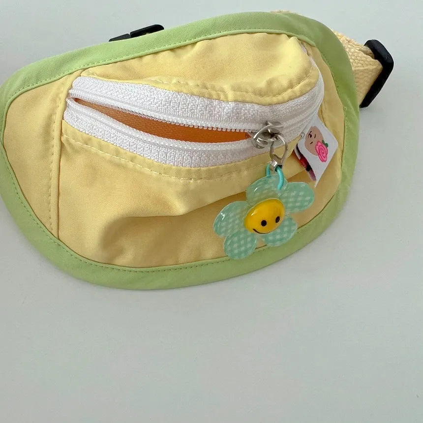Pet backpack for dogs and cats in powder blue, yellow, and green colours with measured sizing