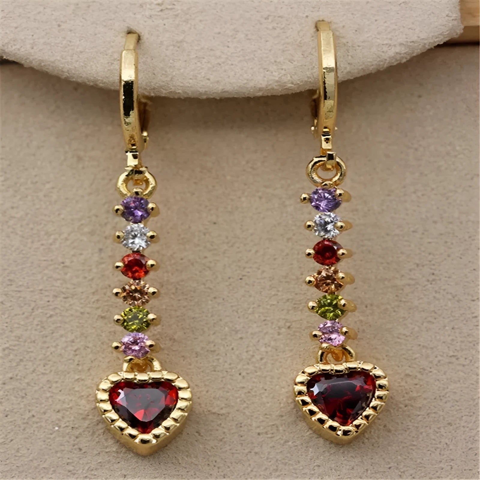 Heart-shaped women's earrings with metallic electroplated finish in gold or silver tone options