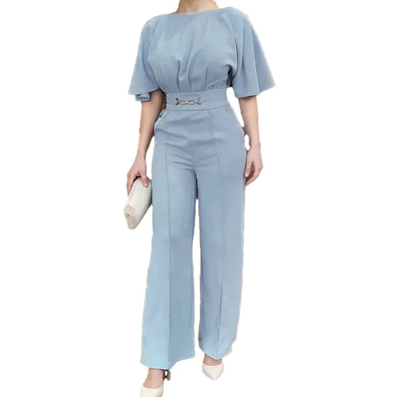 Blue men's two-piece suit with long sleeve jacket and trousers on a hanger