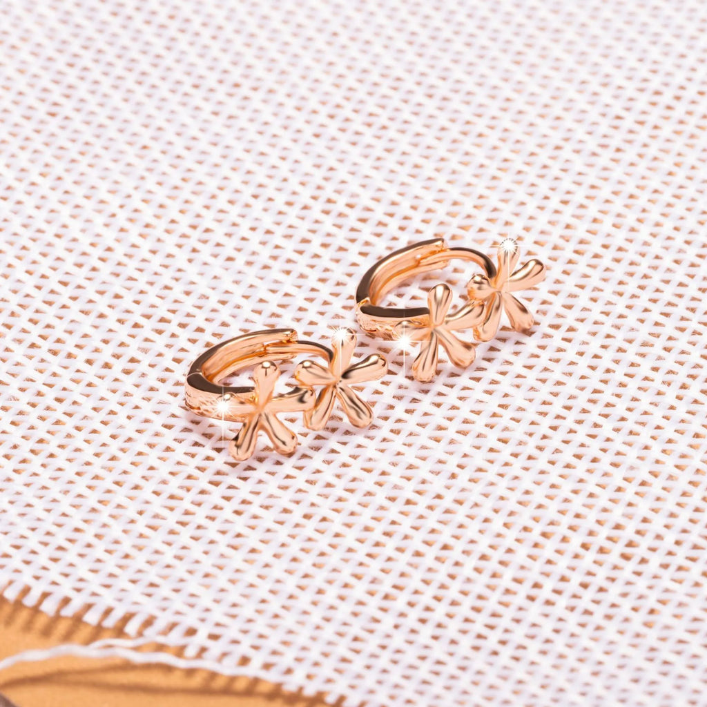 Circular rose gold earrings with waterdrop flower design for women