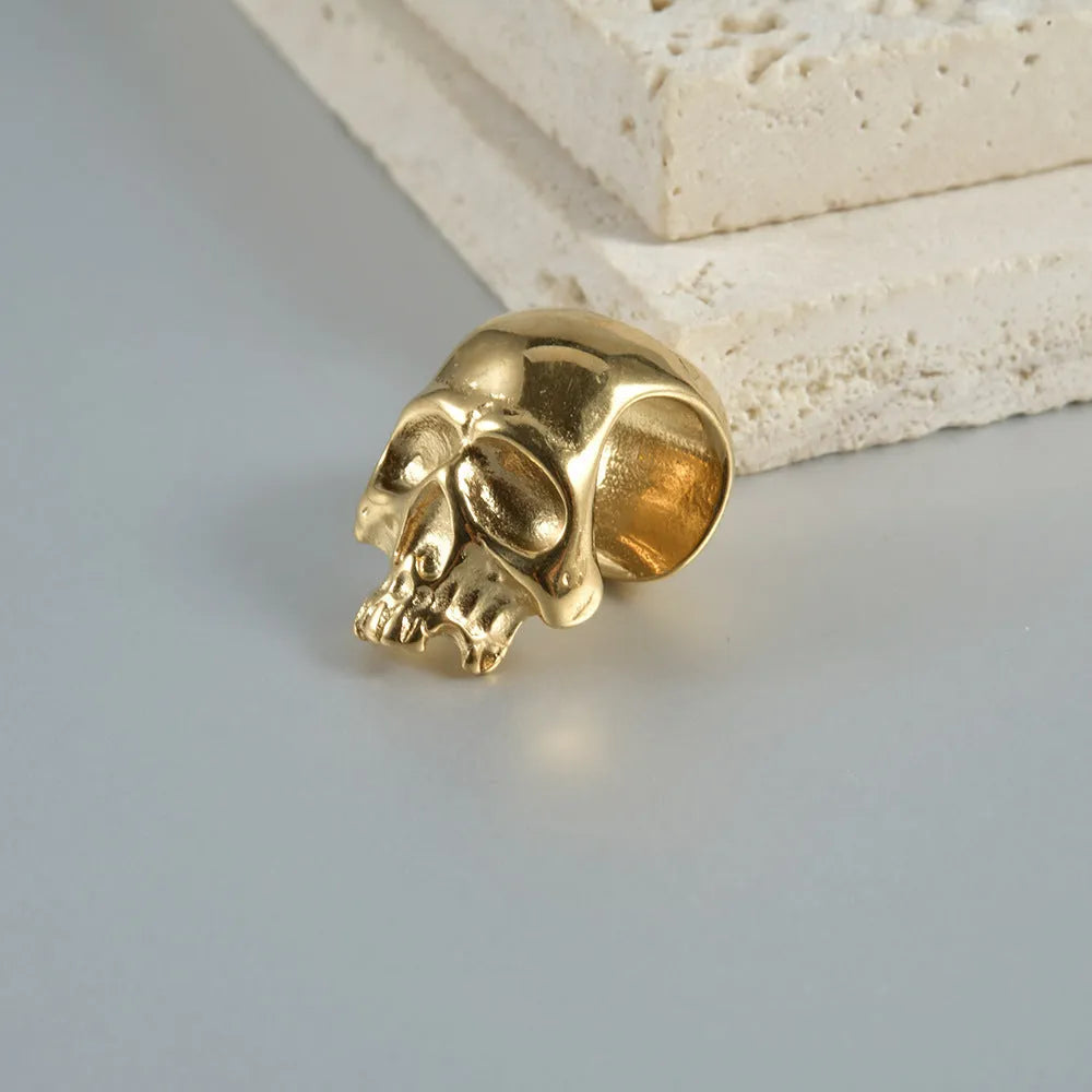 Stainless steel hollow skull Buddha geometric earrings with electroplated colour finishes