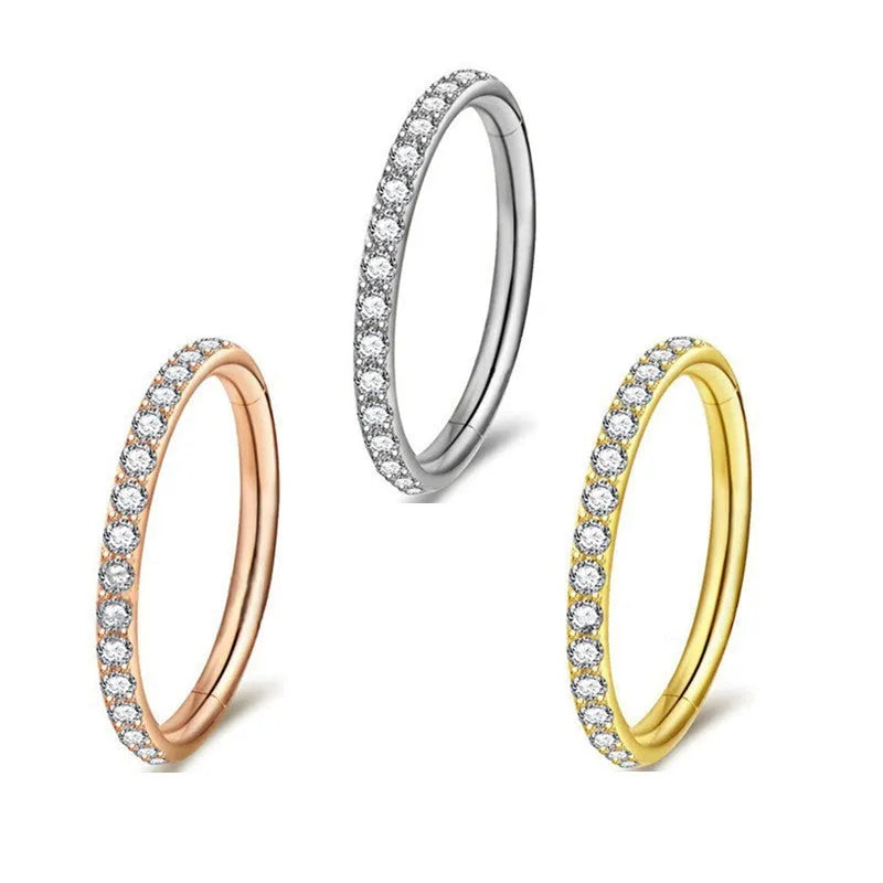 316 stainless steel seamless nose ring with diamond front in gold finish