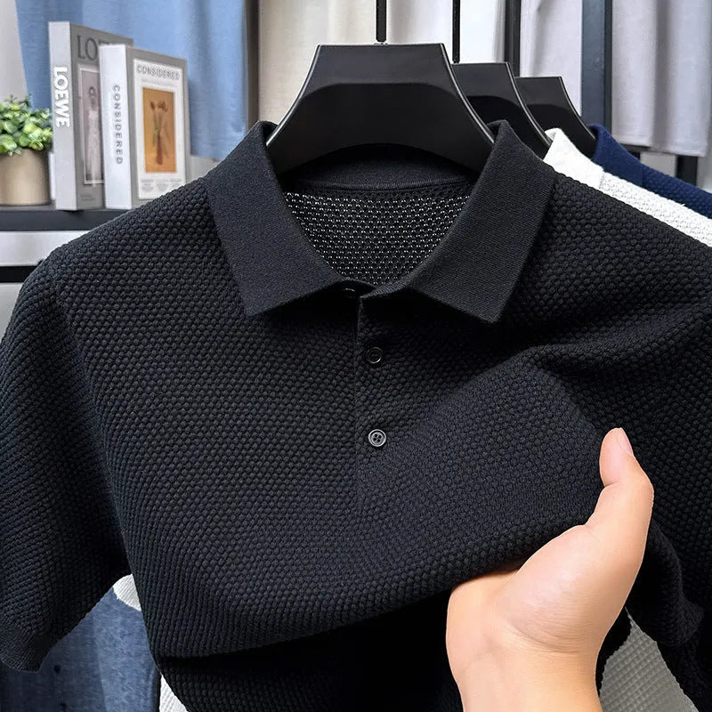 Loose fitting short sleeve cotton sweater in a neutral colour, showing pullover style and casual fit.