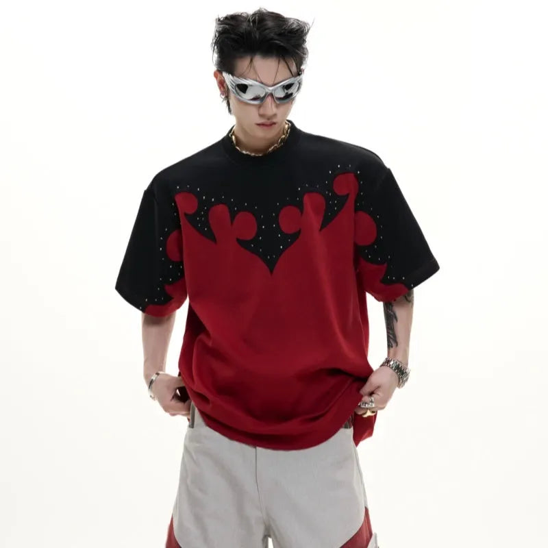 Men's grey cotton T-shirt with burnt flower stitching and rhinestone decoration showing loose fit drop shoulder design