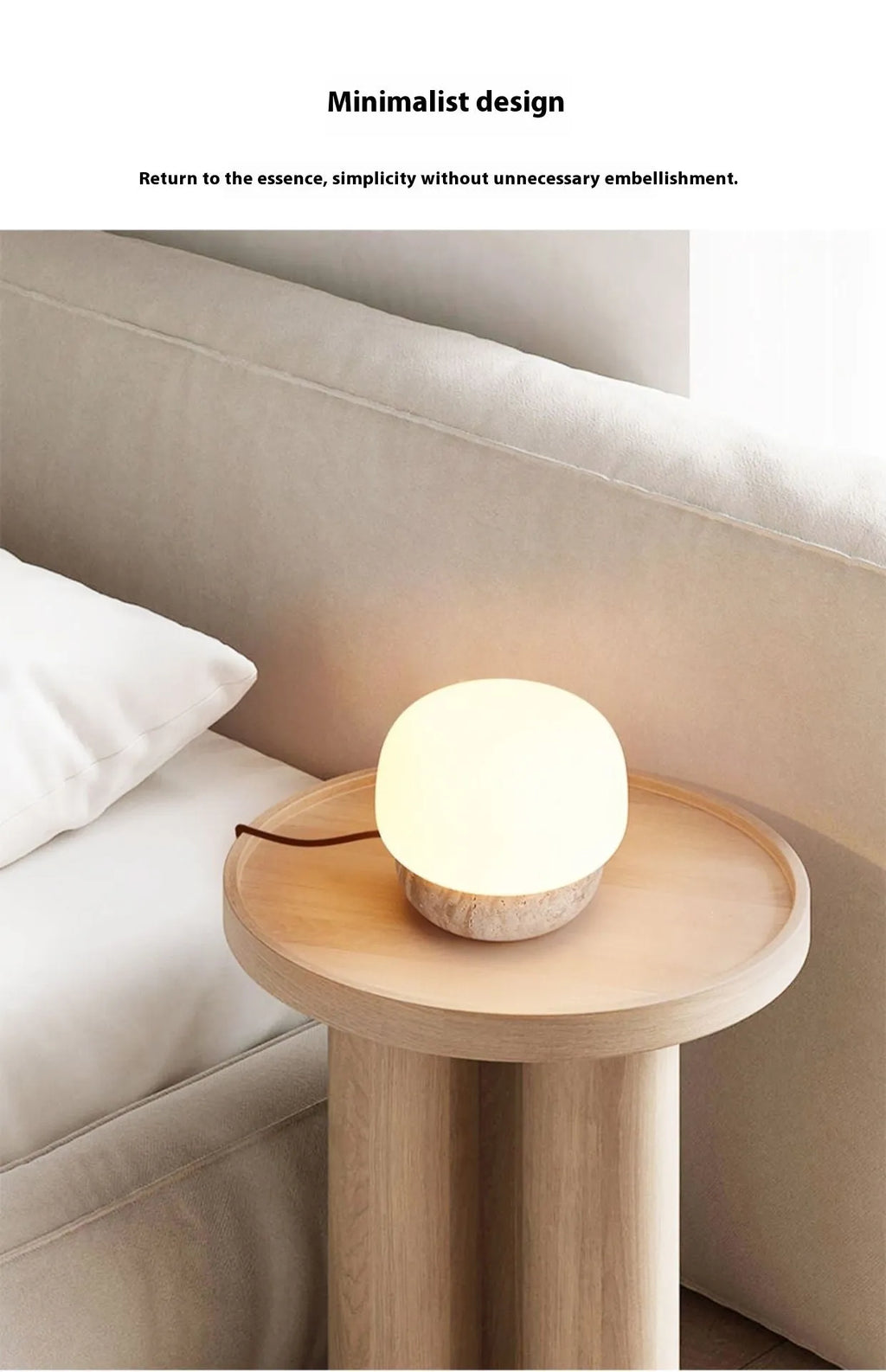 Cream-coloured retro style bedside table lamp with a warm white glow.