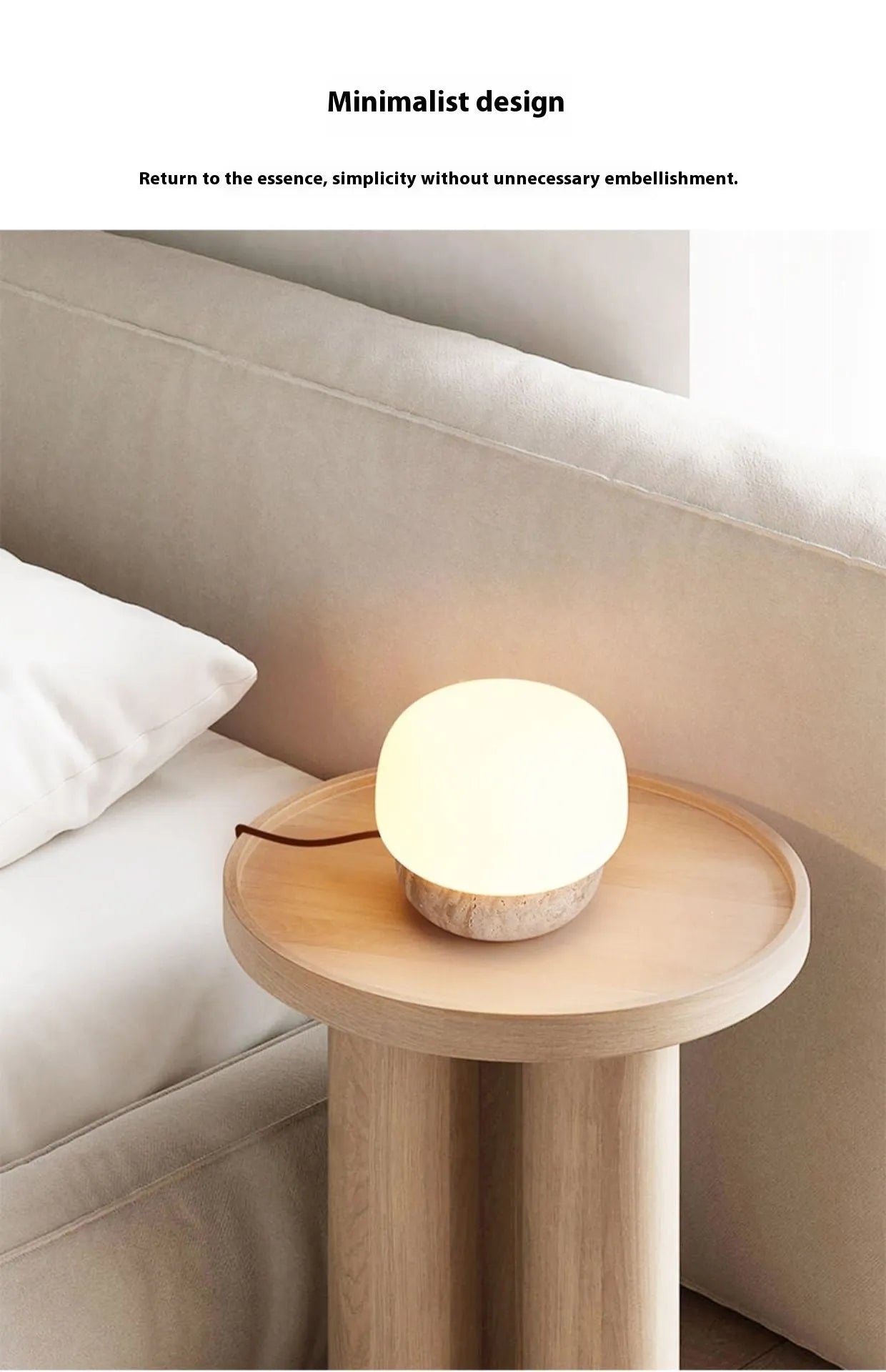 Cream-coloured retro style bedside table lamp with a warm white glow.