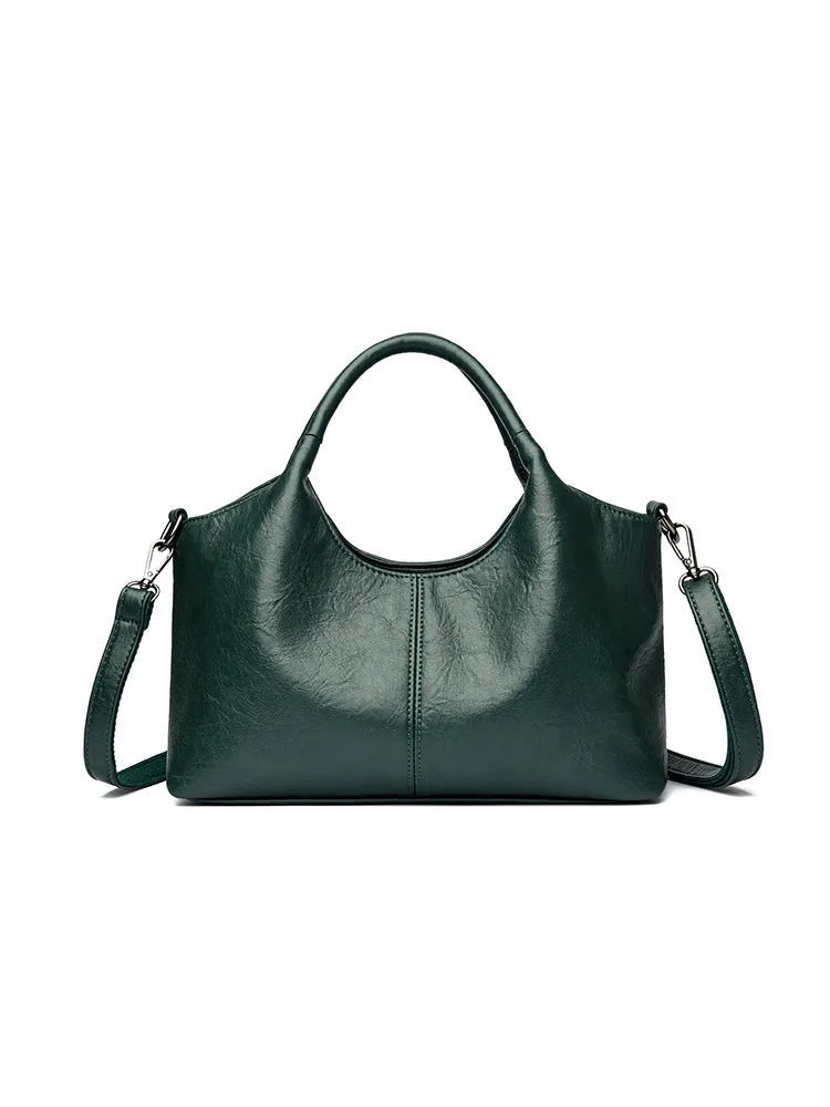 Genuine leather women's cross-body bag in a choice of seven colours including black, brown, and wine red