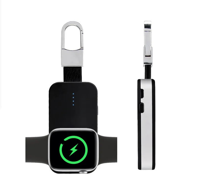 Black Apple Watch portable power bank keychain charger with USB port shown next to an Apple Watch.