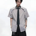 Men's blue loose fit diamond tie patchwork striped shirt with flip collar and button decorations.