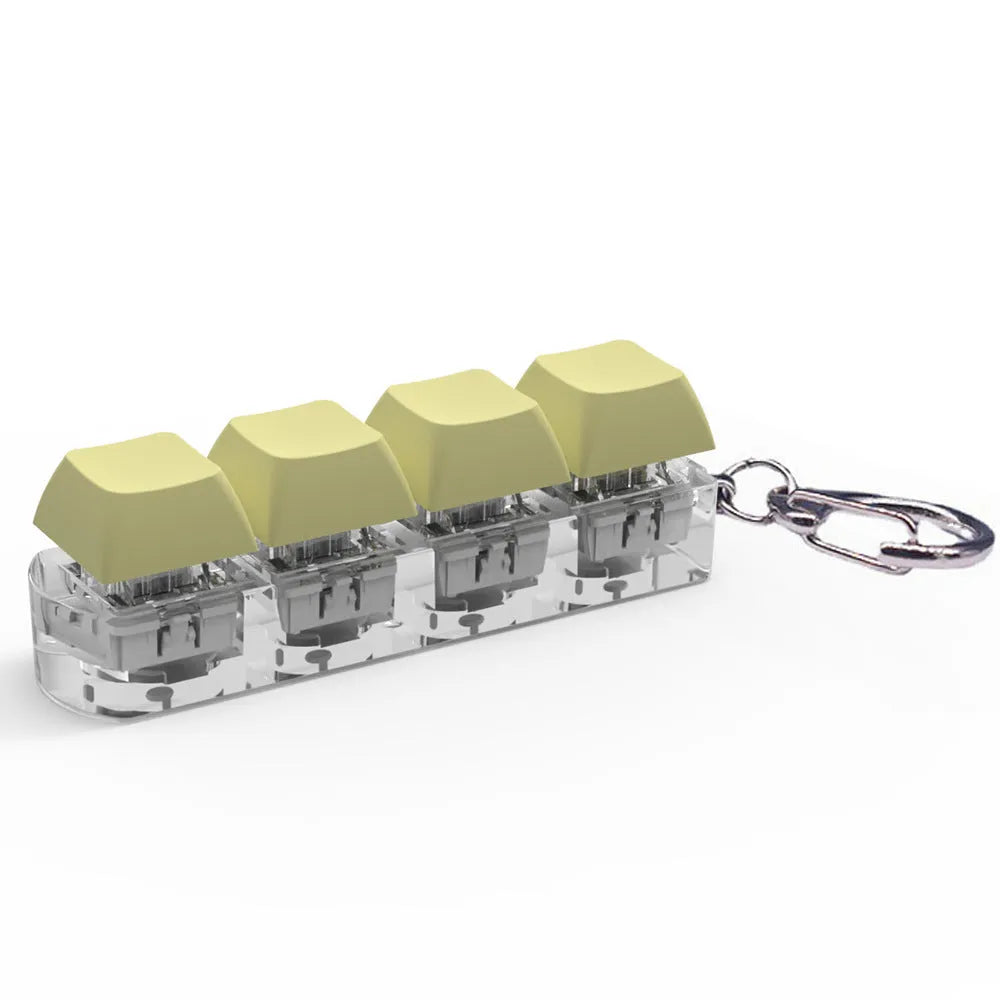 4-key mechanical keyboard switch tester with transparent bottom shell on desk