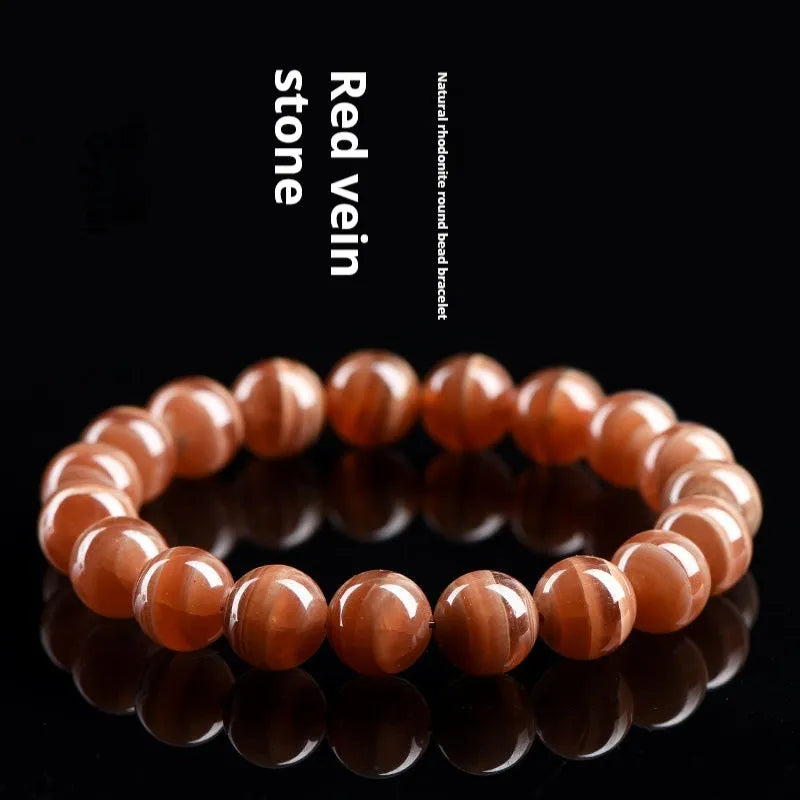 Natural Old Mine Rhodochrosite round beads bracelet with Ruyi design elements